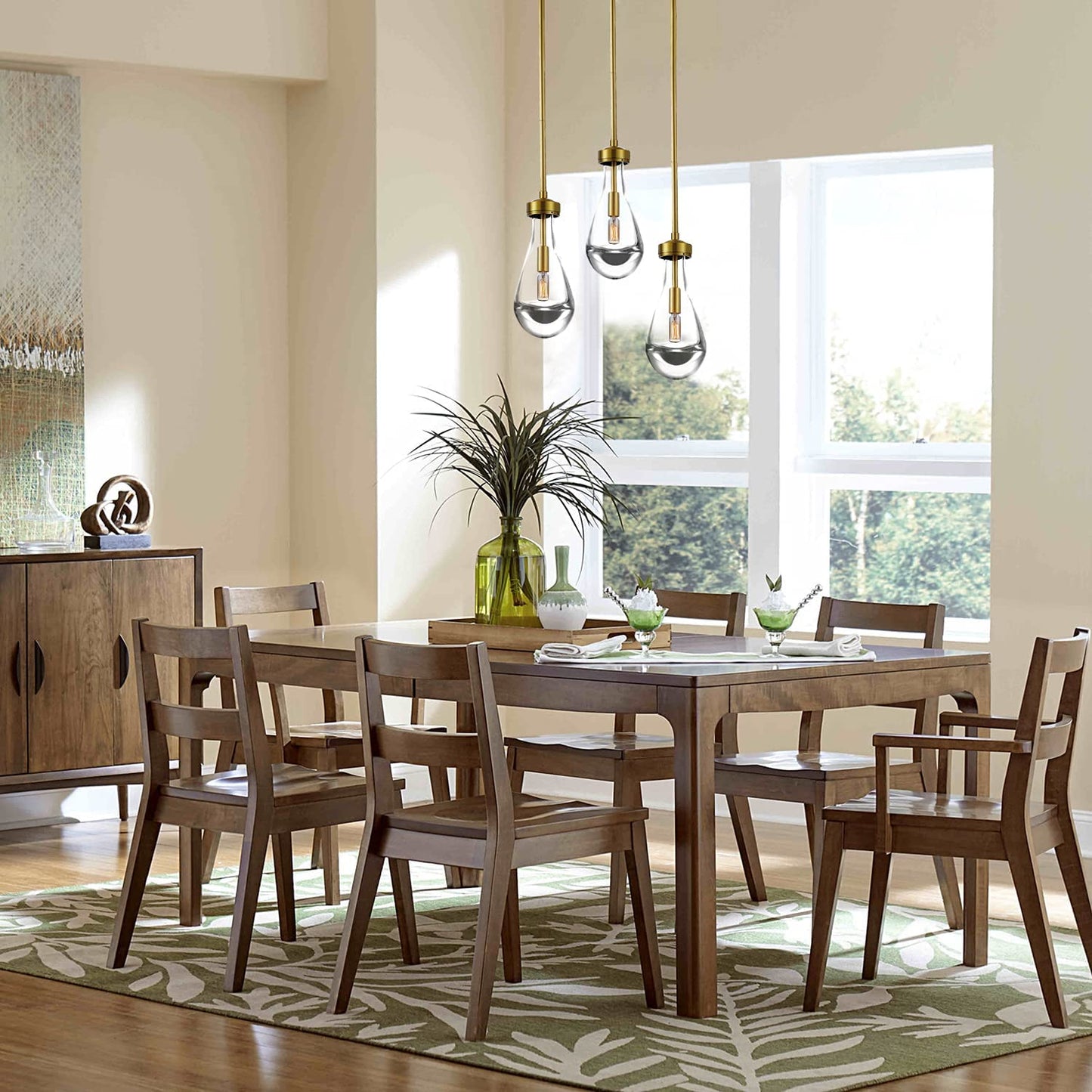 Golden Pendant Light Hand-Blown, featuring a Brushed Brass finish, adds elegance to your space with its exquisite design and warm lighting.