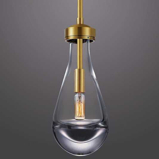 Golden Pendant Light Hand-Blown, featuring a Brushed Brass finish, adds elegance to your space with its exquisite design and warm lighting.